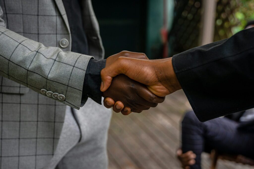 two men shaking hands