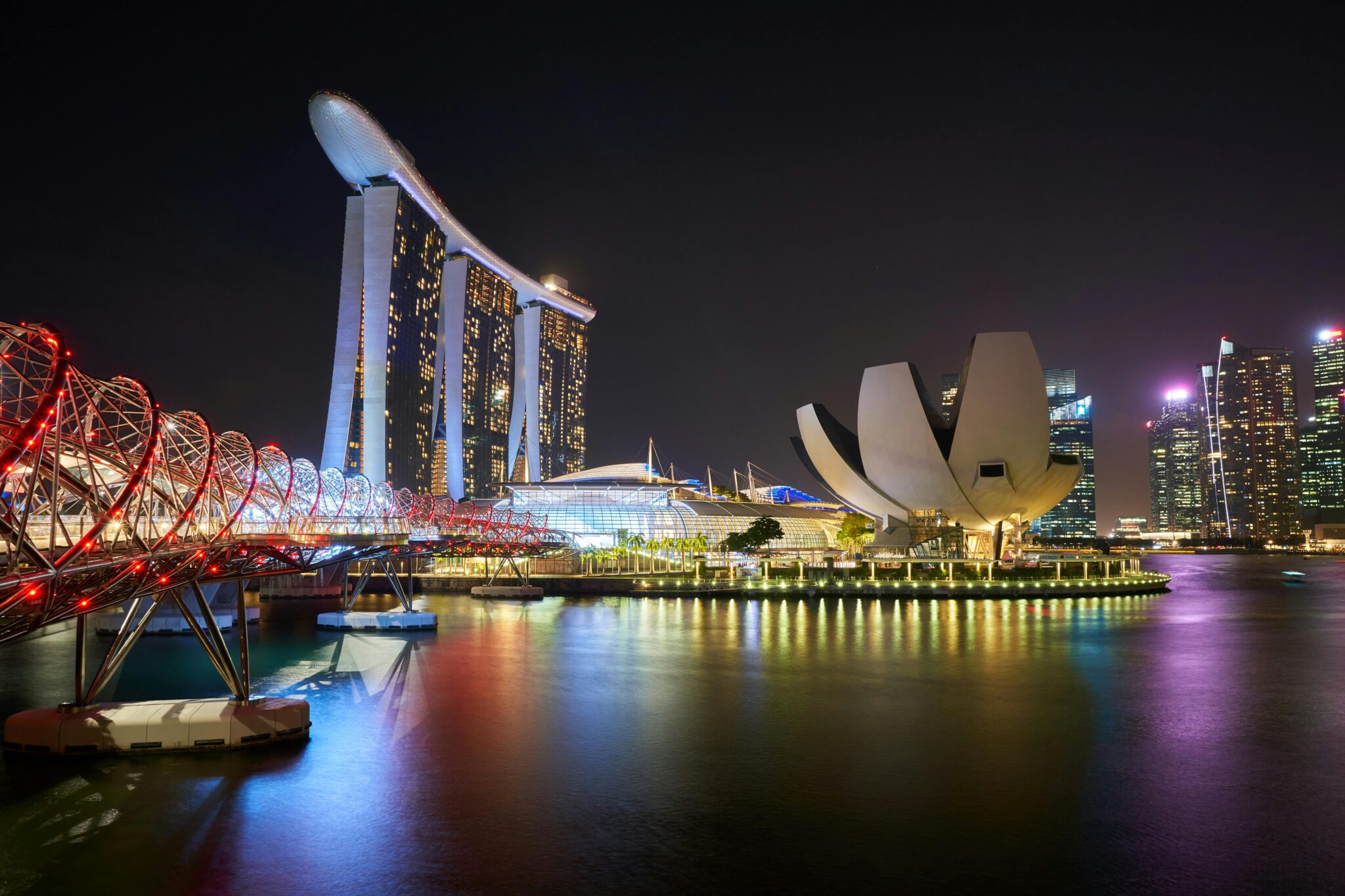 Singapore skyline at night in rainbow colors