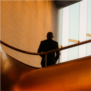 silhoutte of man on a balcony
