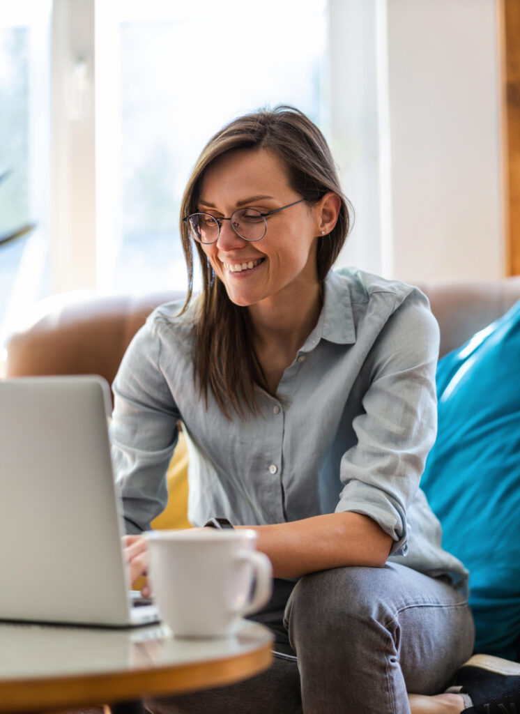 woman smiling while working