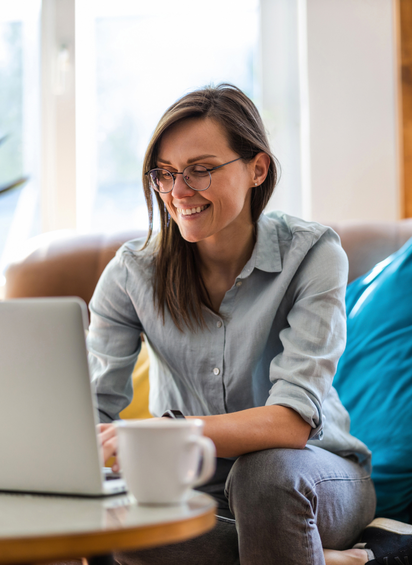 woman smiling while working